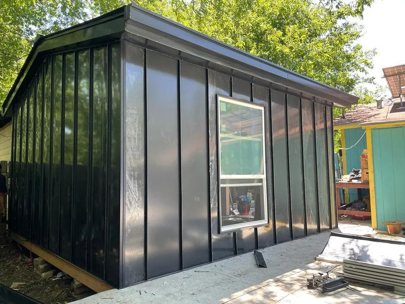 Black standing seam metal wall panels for Metal Roof Installation in Kalamazoo