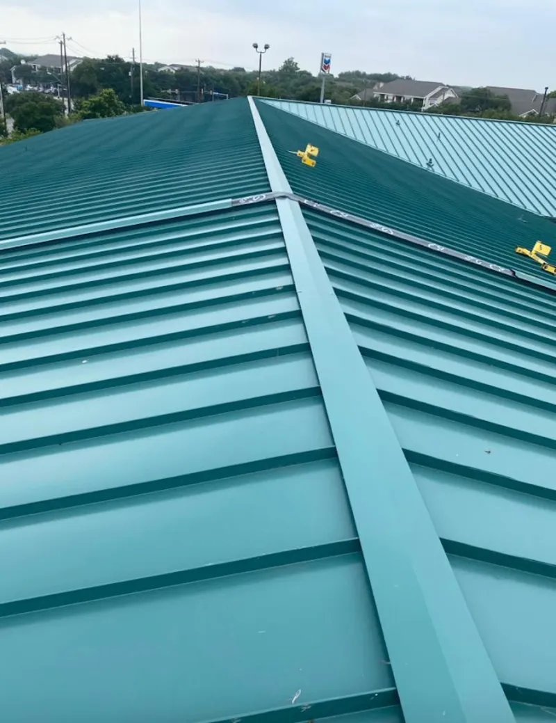 Green commercial metal roof ridge and valley for Metal Roof Repair in Kalamazoo